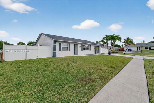 141 Eider Ct, Royal Palm Beach, FL 33411