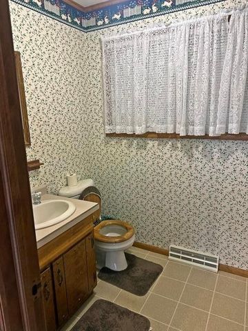 519 W BJORNSTAD STREET, Owen, WI 54460