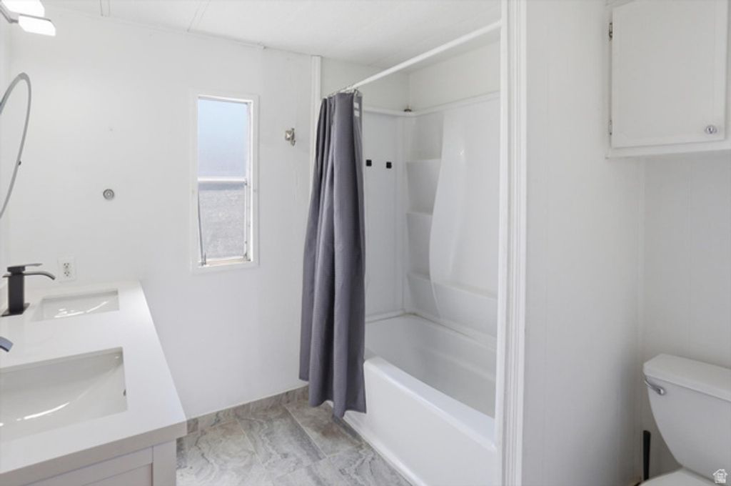 Image 13 of property listing at 3860 MIDLAND DR #A-60, Roy, UT 84067