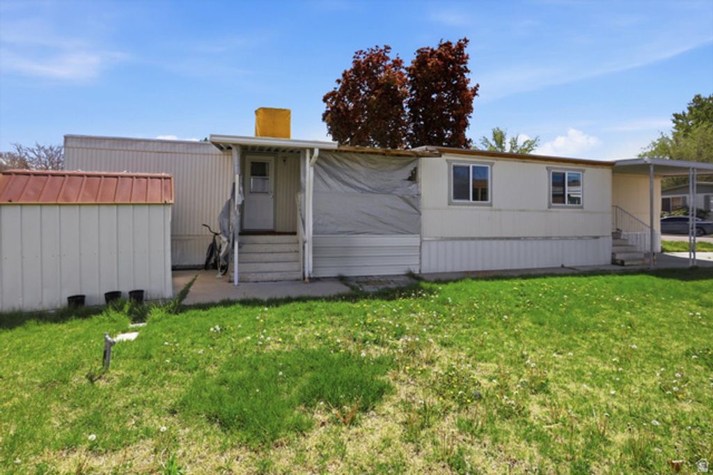 Image 18 of property listing at 3860 MIDLAND DR #A-60, Roy, UT 84067