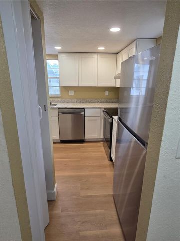 6062 AMBERLY AVENUE F53, Orlando, FL 32822