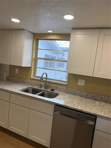 6062 AMBERLY AVENUE F53, Orlando, FL 32822