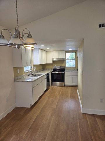 6062 AMBERLY AVENUE F53, Orlando, FL 32822
