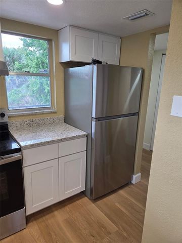 6062 AMBERLY AVENUE F53, Orlando, FL 32822