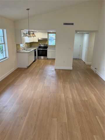 6062 AMBERLY AVENUE F53, Orlando, FL 32822