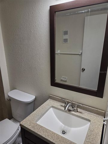 6062 AMBERLY AVENUE F53, Orlando, FL 32822
