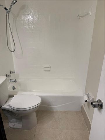 6062 AMBERLY AVENUE F53, Orlando, FL 32822