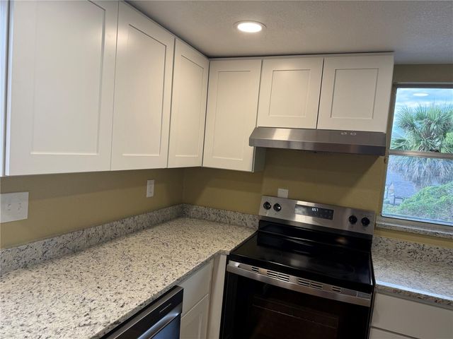 6062 AMBERLY AVENUE F53, Orlando, FL 32822