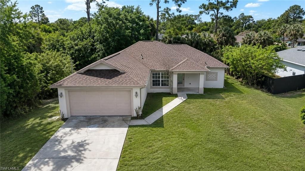 2907 12th ST W, LEHIGH ACRES, FL 33971 — photo 3