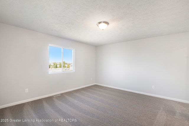 1080 Woodridge Drive, St. Johns, MI 48879