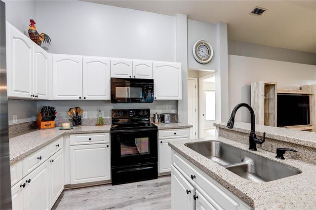 2242 TOWERING OAKS CIRCLE, Seffner, FL 33584