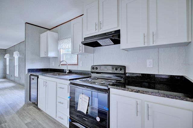 8595 NW 13TH COURT, Ocala, FL 34475