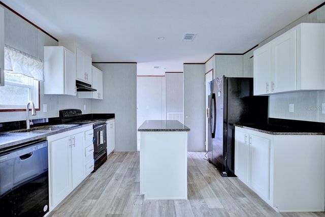 8595 NW 13TH COURT, Ocala, FL 34475