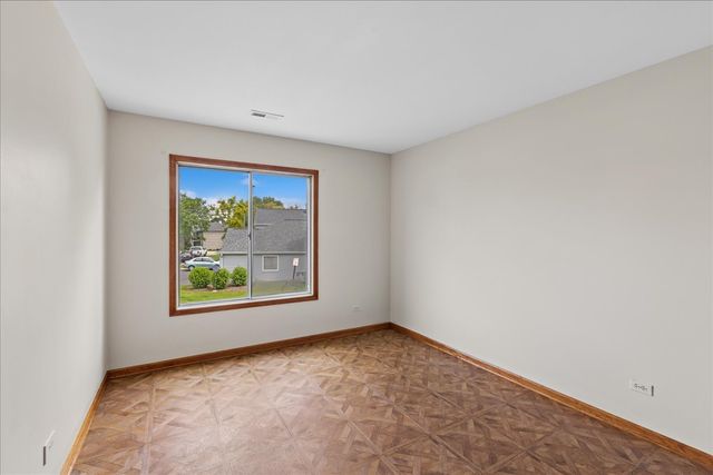 7050 Brighton Court 203, Woodridge, IL 60517