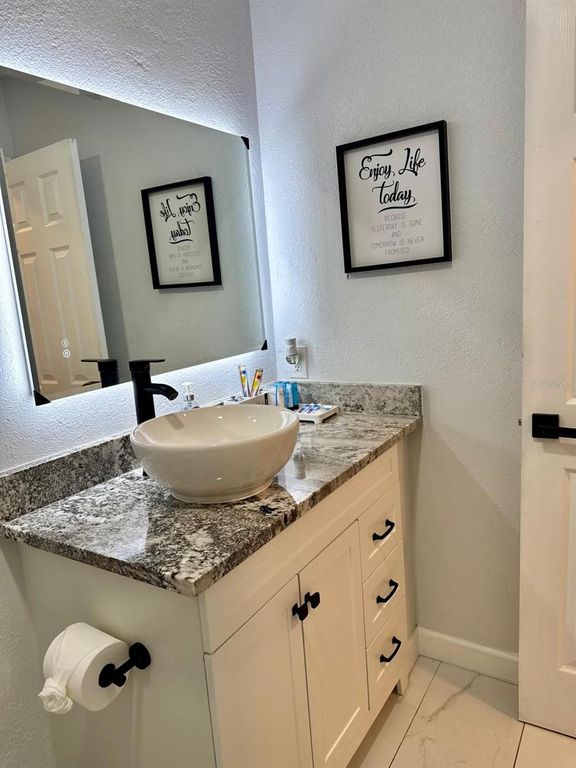 Image 15 of property listing at 9812 N OKLAWAHA AVENUE, Tampa, FL 33617