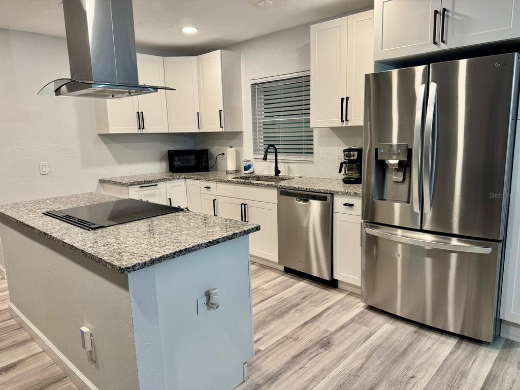 Image 8 of property listing at 9812 N OKLAWAHA AVENUE, Tampa, FL 33617