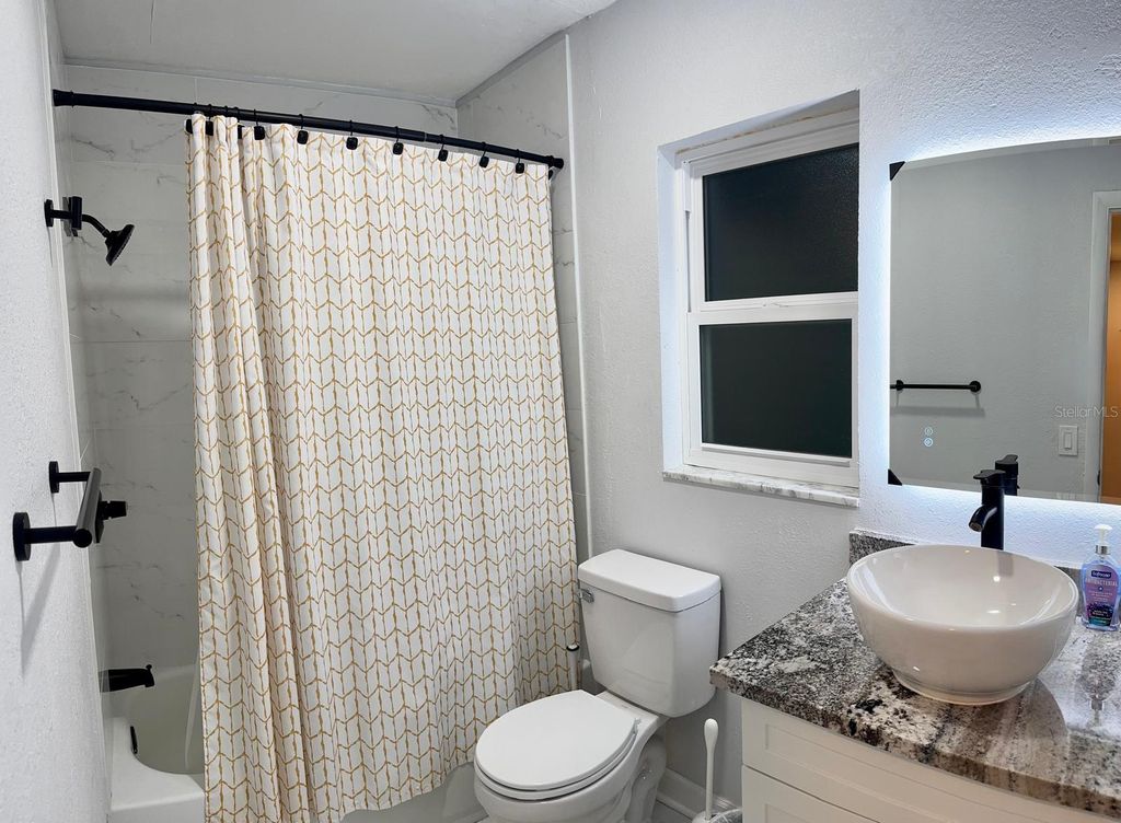 Image 10 of property listing at 9812 N OKLAWAHA AVENUE, Tampa, FL 33617