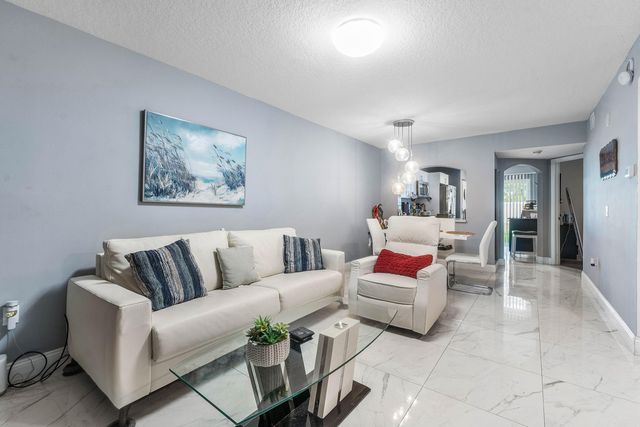 3516 BRIAR BAY Boulevard 103, West Palm Beach, FL 33411