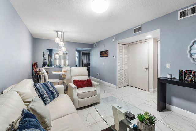3516 BRIAR BAY Boulevard 103, West Palm Beach, FL 33411