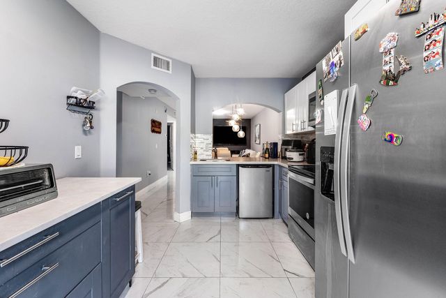 3516 BRIAR BAY Boulevard 103, West Palm Beach, FL 33411