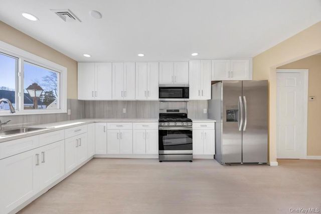 21 Clay Lane, Levittown, NY 11756