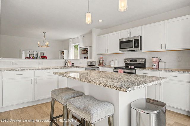 1058 N Crandell Drive, Charlotte, MI 48813
