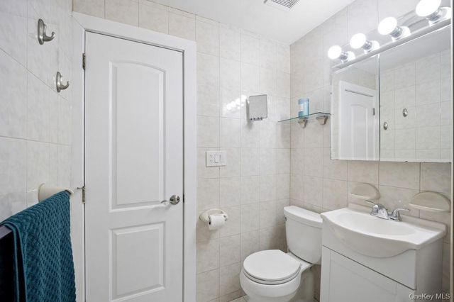 76-04 68th Avenue, Middle Village, NY 11379
