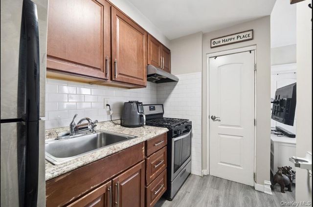 76-04 68th Avenue, Middle Village, NY 11379