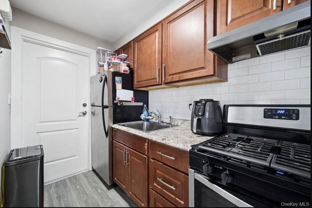 76-04 68th Avenue, Middle Village, NY 11379