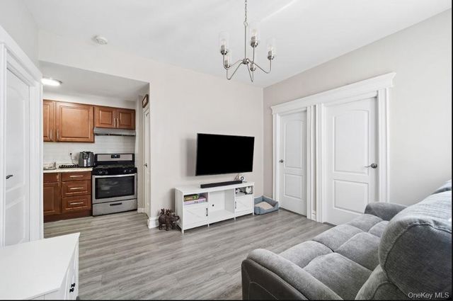 76-04 68th Avenue, Middle Village, NY 11379