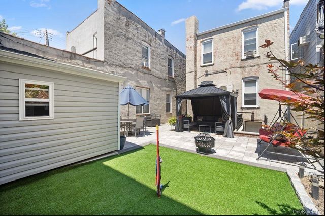 76-04 68th Avenue, Middle Village, NY 11379