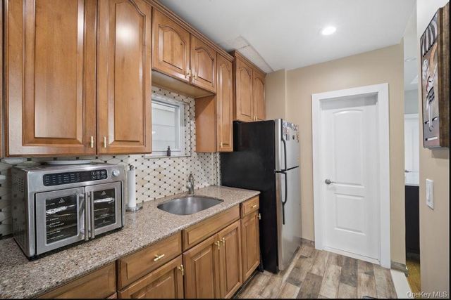 76-04 68th Avenue, Middle Village, NY 11379