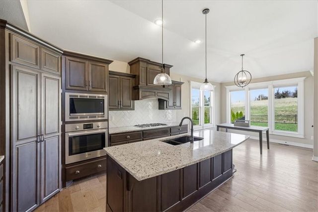 851 Creekmoor Pond Lane, Raymore, MO 64083