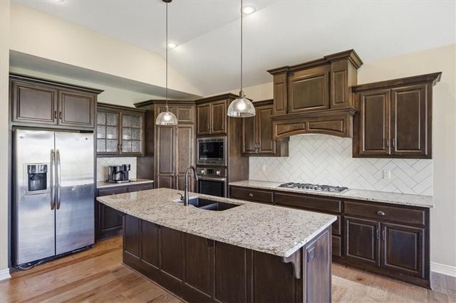 851 Creekmoor Pond Lane, Raymore, MO 64083