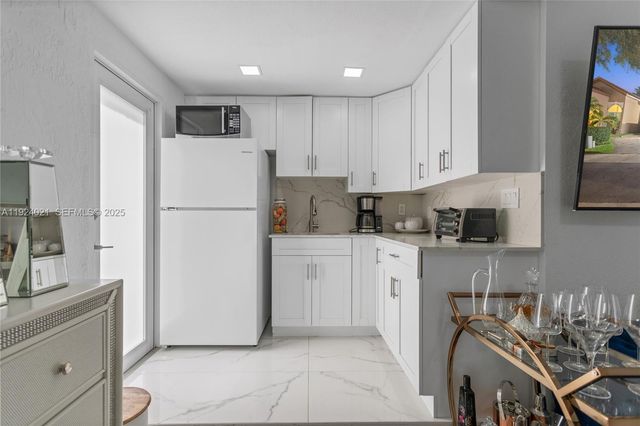 8740 NW 153rd Ter, Miami Lakes, FL 33018