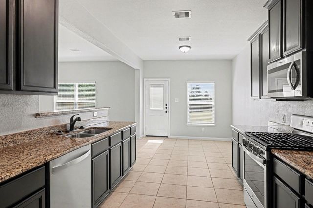 7722 Boulder Sunstone Lane, Conroe, TX 77304