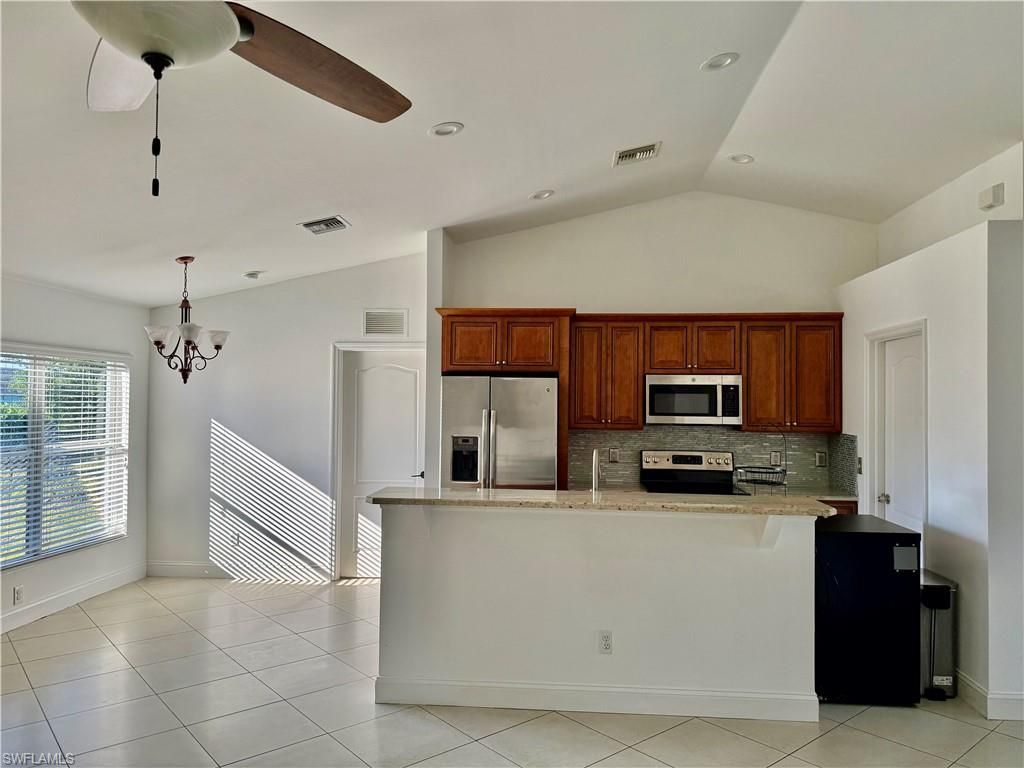 Image 6 of property listing at 2833 NW 6th PL, Cape Coral, FL 33993
