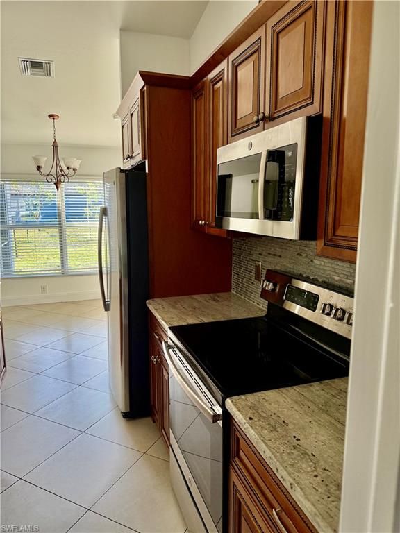 Image 8 of property listing at 2833 NW 6th PL, Cape Coral, FL 33993