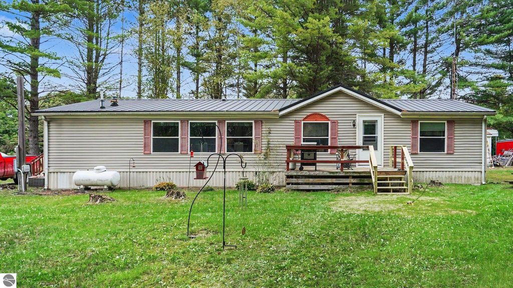 Image 1 of property listing at 936 N Coleman Road, Shepherd, MI 48883