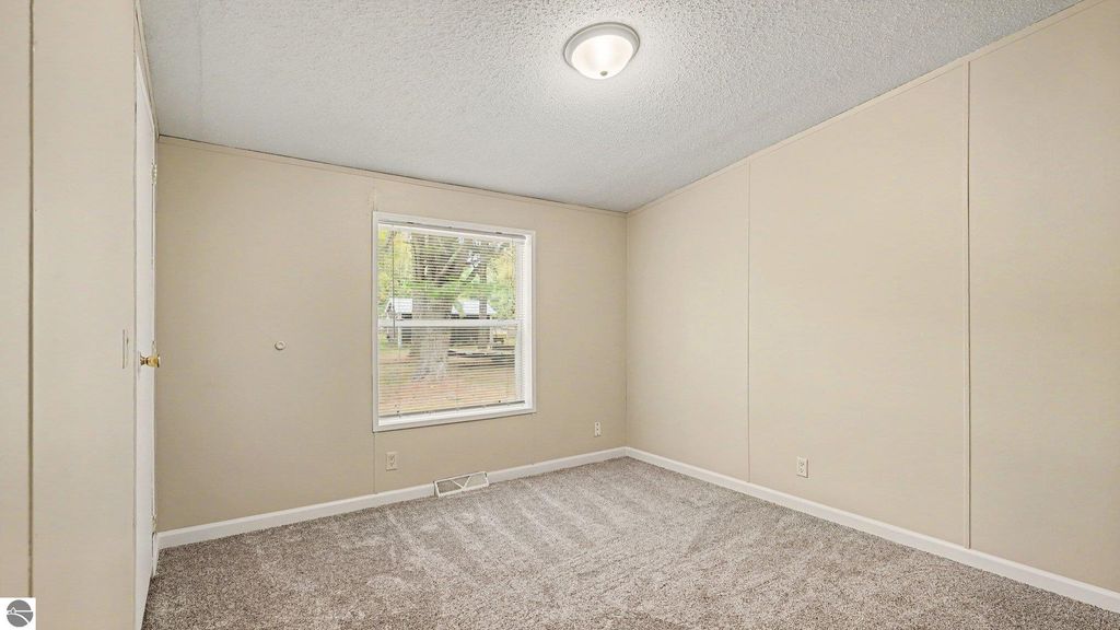 Image 10 of property listing at 936 N Coleman Road, Shepherd, MI 48883