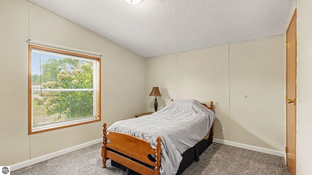 Image 8 of property listing at 936 N Coleman Road, Shepherd, MI 48883