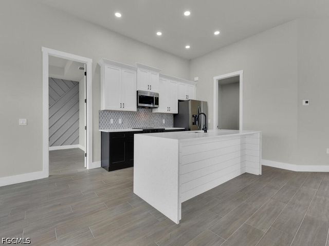 1517 NW 21st PL, Cape Coral, FL 33993