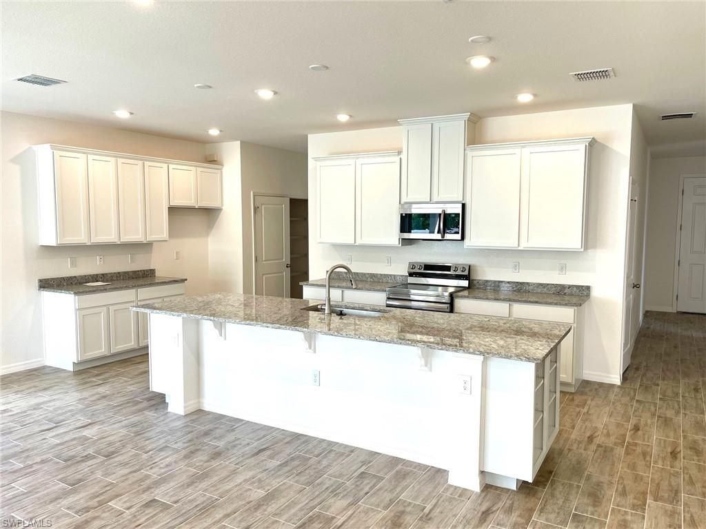 324 NW 1st PL, CAPE CORAL, FL 33993 — photo 3