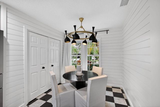 25 Grand Bay Circle, Juno Beach, FL 33408