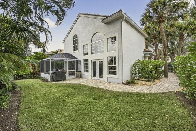 25 Grand Bay Circle, Juno Beach, FL 33408