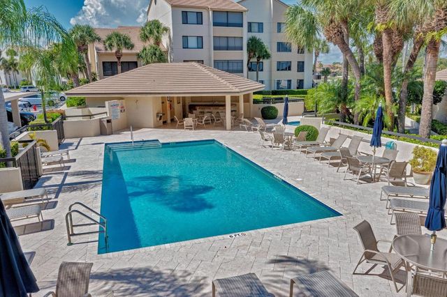 25 Grand Bay Circle, Juno Beach, FL 33408