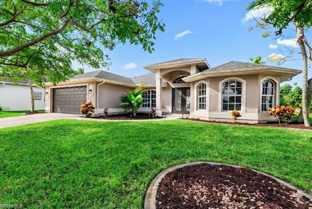 314 NE 12th CT, CAPE CORAL, FL 33909 — exterior