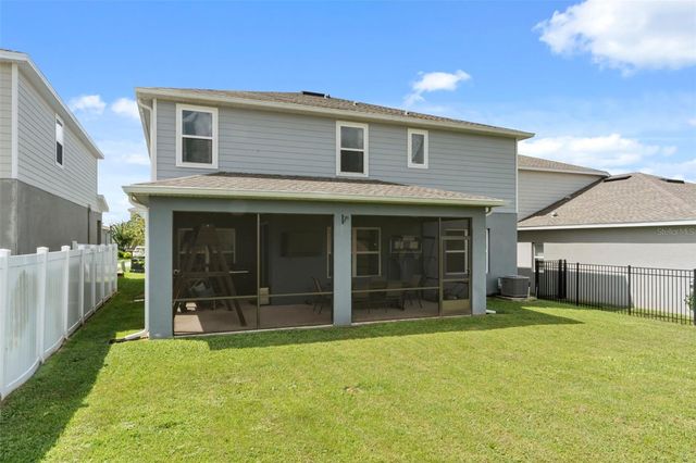 3053 HILL POINT STREET, Minneola, FL 34715