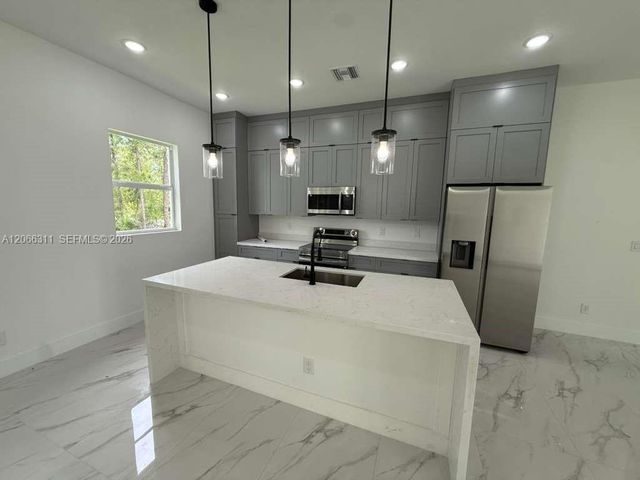 723 Epps Brown Street E, Lehigh Acres, FL 33974