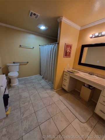 911 W Creek, Checotah, OK 74426